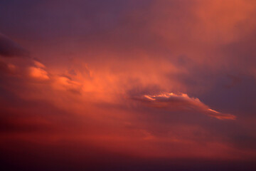 Fototapeta na wymiar Red clouds at sunset. Dramatic sunset sky