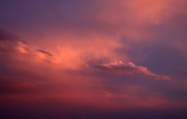 Fototapeta na wymiar Red clouds at sunset. Dramatic sunset sky