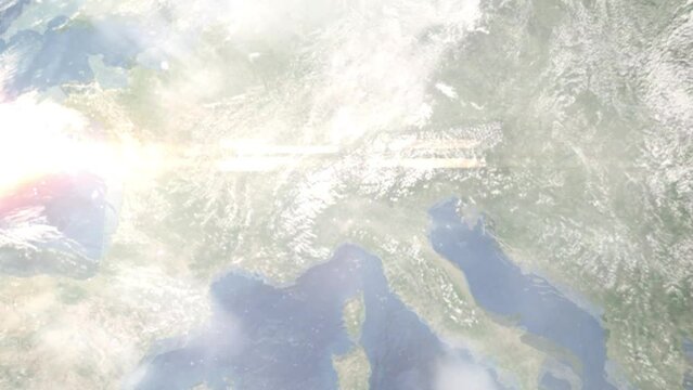 Earth zoom in from outer space to city. Zooming on Varese, Italy. The animation continues by zoom out through clouds and atmosphere into space. Images from NASA