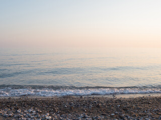 Combining sky and sea on the horizon, calm sea, relaxing beautiful landscape in pastel colors