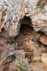 An excavated cave with traces of archaeological activity in a national reserve - Nahal Mearot Nature Preserve, near Haifa, in northern Israel