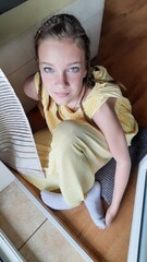 woman sitting on sofa