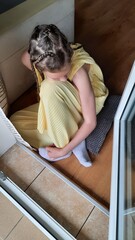 child playing with dog