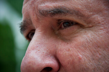 Fototapeta premium old man eyes looking. cropped view of face