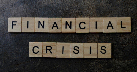 financial crisis text on wooden square, business motivation quotes