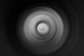 digital radial motion blurred picture in black and white mode