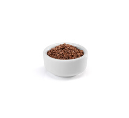 Chocolate cereal on a white ceramic ramekin, isolated on white