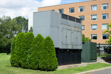 A back up generator beside an hospital