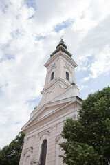 Fototapeta na wymiar Serbian Orthodox church of st. George at Novi Sad, Serbia, Europe. Cloudy sky on spring day.