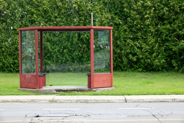 Fototapeta na wymiar A bus stop on a street corner