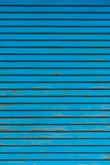 Obraz premium 閉じている青いシャッターの背景素材