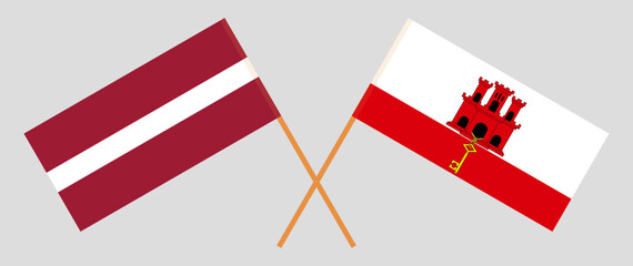 Crossed flags of Latvia and Gibraltar. Official colors. Correct proportion