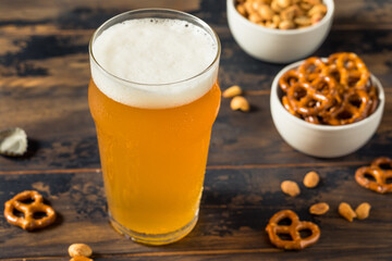 Cold Boozy Refreshing Oktoberfest Beer with Pretzels