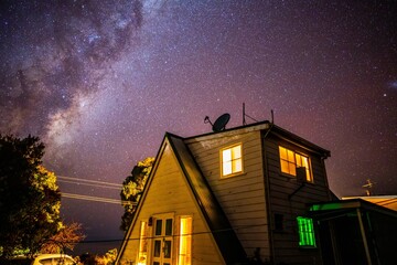 Stars and milky way over a house in tasmania australia. stars above a house