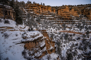Hiker Along Snow Covered Bright Angel Trail