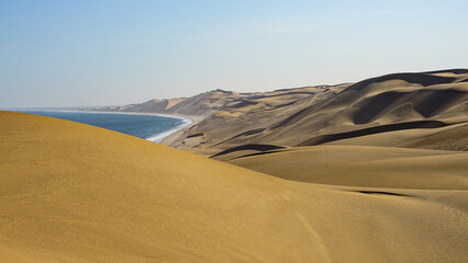 Fototapeta na wymiar Namibia. Sandwich Harbour desert dunes by the ocean