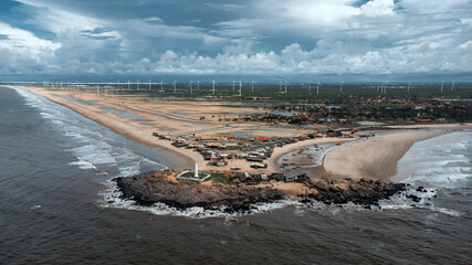 Paisagem Litoral Praia Pedra do Sal Parnaíba Piauí Delta Areia Mar Oceano Céu Nuvens Farol Ondas Energia Eólica Viagem Turismo Turístico Férias Nordeste Brasil Paradisíaco Tropical Pedras Costa  © Pedro