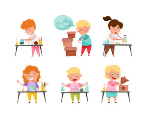 Happy cute little boys and girls making paper crafts at lesson set cartoon vector illustration