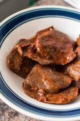Anticucho peruvian food typical popular Pieces of raw cow heart