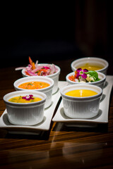 Little white bowls with traditional peruvian sauces food