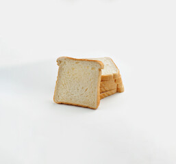 Pile of sliced white bread, isolated on white for mock ups and photo montages