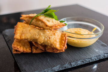 Tequenos filled fried dough fast food Peruvian snack restaurant mise en place