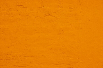Fototapeta premium Orange grungy wall backdrop or texture