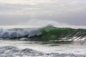 waves breaking on the shoreline
