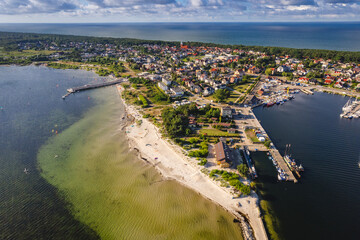 Summer view from the air of the Hel Peninsula, a calm and nice landscape over Jastarnia village. - obrazy, fototapety, plakaty