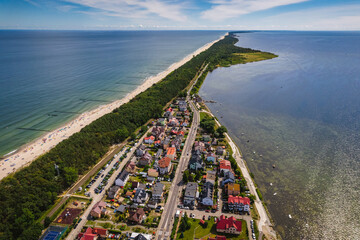 Summer view from the air of the Hel Peninsula, a calm and nice landscape over Chalupy village.