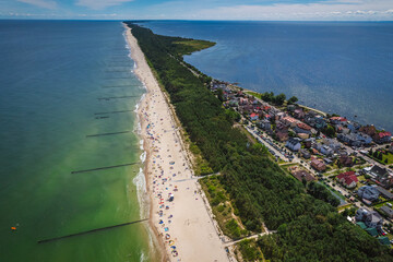 Summer view from the air of the Hel Peninsula, a calm and nice landscape over Chalupy village.