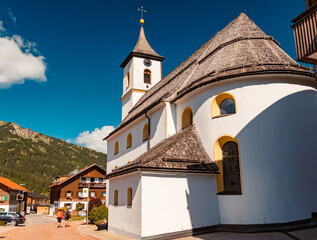 Beautiful church on a sunny summer day at the famous Tannheimer Tal valley, Zoeblen, Tyrol, Austria