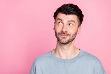 Obraz premium Photo of minded nice person look interested empty space thinking isolated on pink color background