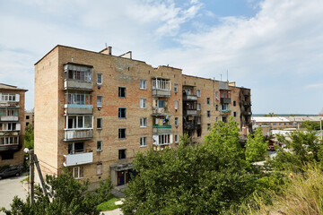 Fototapeta na wymiar Horenka, Ukraine - August 25, 2022: the consequences of russian invasion in Kyiv region near Gostomel. Civil buildings were bombed and heavily damaged