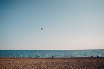 Paragliding on sky and sea background in Turkey.
