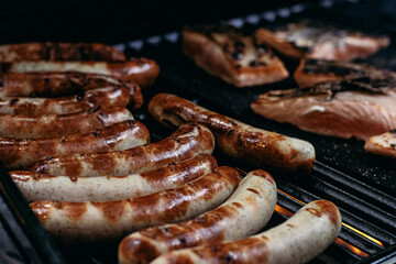 sausages on the grill