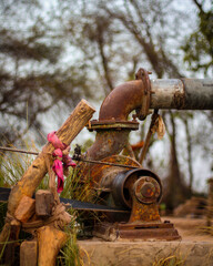 old rusty water pump