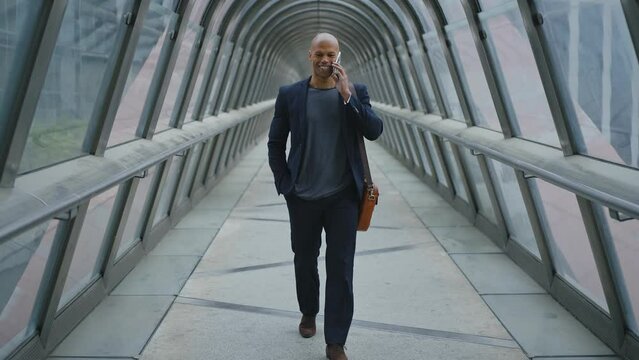 Cinematic storytelling video of a young businessman going around in the city. Successful modern sales man with suit and casual tshirt ready for an another great working day
