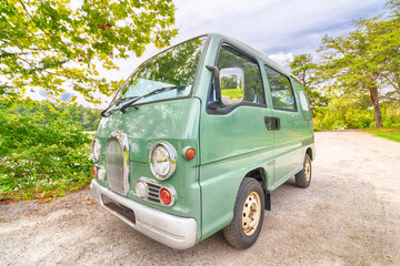 Green micro Van with wood trim