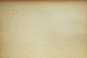 Old vintage brown paper surface texture close up