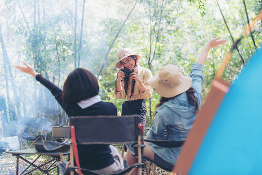 Group Of Happy Asian Teenage Girls Taking Pictures Together. Camping Next To The Tent Outdoor Activities Adventure Travel Or Holiday Vacation Ideas