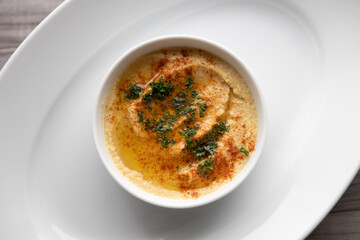 Homemade hummus with olive oil