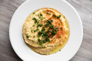 Homemade hummus with olive oil