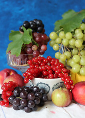 Naklejka na ściany i meble Fresh summer fruit and berry on a table. Natural antioxidants. Healthy eating concept. 