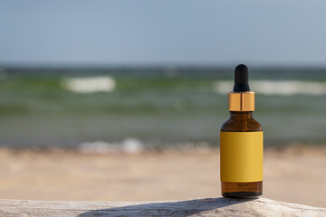 Mock-up for zero-waste cosmetic product. Natural composition, beaches and wood. Copy space, sea waves in the background.