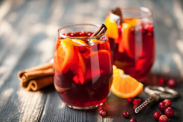 Mulled wine with orange and a cranberry