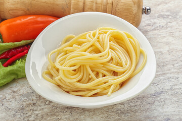 Italian pasta boiled spaghetti with oil