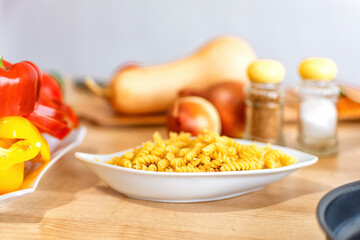 Italian Fusilli pasta in white plate.