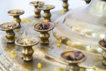 Candle stand in the church. Lighting the Fire and prayer in the temple.
