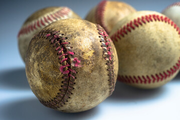 Close up old baseball isolated on a white background.